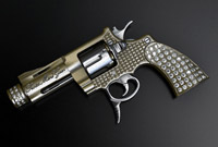 Swiss gold mini gun